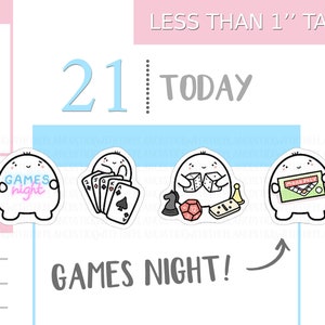 May include: A sheet of stickers featuring cartoon characters holding game-related items. The stickers include a character with the text "Games Night", playing cards, dice, chess pieces, and a Monopoly board. The text "Games Night!" is also present.