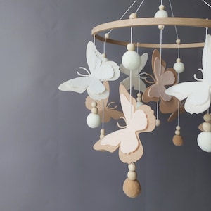 Butterfly mobile baby girl Crib pom pom boho mobile musical bebe Nursery felt baby mobile neutral Hanging ball Cot wood beads mobile image 2
