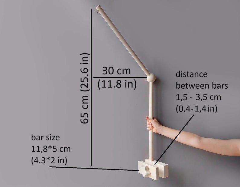 May include: White wooden mobile arm with a 30-inch (76 cm) long arm and a 11.8-inch (30 cm) vertical bar. The arm is adjustable and can be moved to different positions. The distance between the bars can be adjusted from 0.4 to 1.4 inches (1.5 to 3.5 cm).