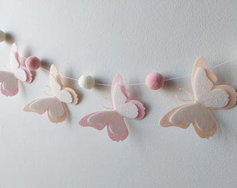 Butterfly garland for baby girl nursery – Felt butterflies and pom poms – Soft pink peach butterfly wall decor – Baby room decoration