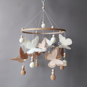 Butterfly mobile baby girl Crib pom pom boho mobile musical bebe Nursery felt baby mobile neutral Hanging ball Cot wood beads mobile