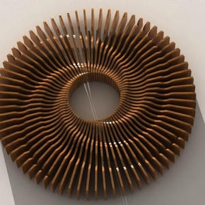May include: A circular, wooden decorative object with a central hole. The object is made of numerous thin, curved wooden slats arranged in concentric circles, creating a layered, textured effect. The wood has a warm, natural brown tone.