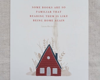 May include: A print featuring a red house illustration with a dark blue roof and chimney, surrounded by beige foliage. The quote "SOME BOOKS ARE SO FAMILIAR THAT READING THEM IS LIKE BEING HOME AGAIN" by Louisa May Alcott is printed in red.