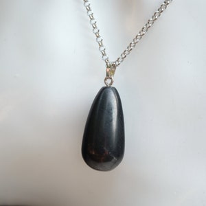 Black string necklace, TRIBAL pendant, segments of tears