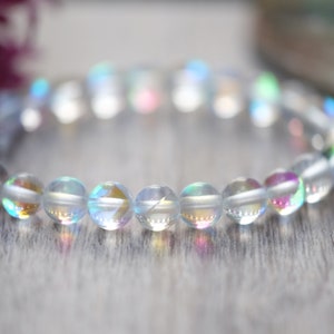 6mm 8mm 10mm 12mm Mystic Angel Clear Rainbow Aura Crystal Mermaid Bracelet Smooth or Faceted Optional Silver Lotus Charm