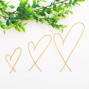 Heart shaped asymmetrical wire wall art, home decoration