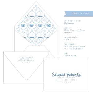 May include: An alabaster envelope with an Abby Coastal Ogee pattern liner featuring blue sailboats, starfish, and shells. The envelope displays a return address, and a matching card shows the name Edward Roberts with a mailing address in blue ink.