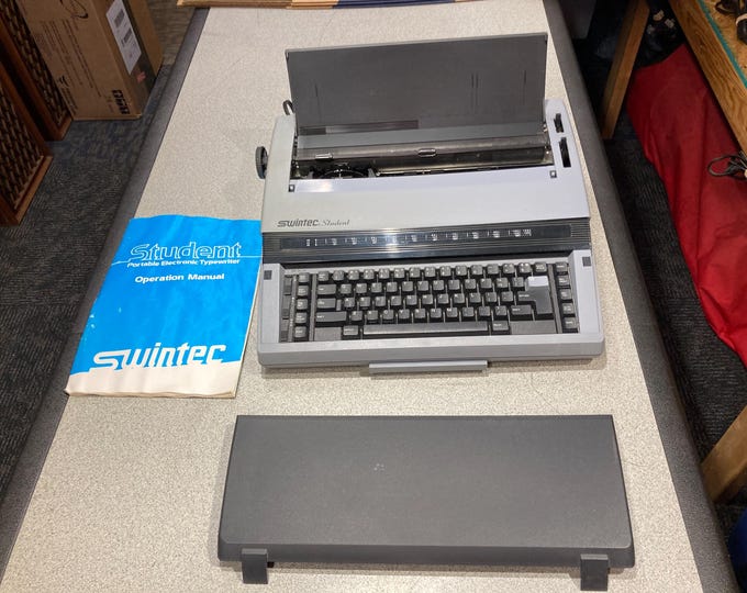 Swintec Student Portable Typewriter With Manual. Tested and Functions Work.