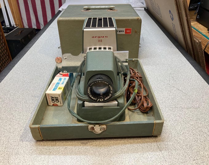 Argus 300 Slide Projector. Powers On & Lamp Works. No Further Testing...Selling As Is.