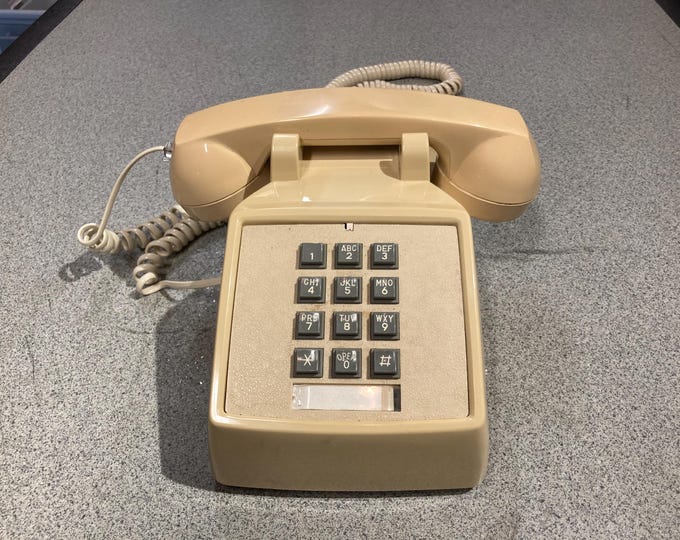 Premier Land Line Push Button Telephone With Volume Control. Model NS-M002