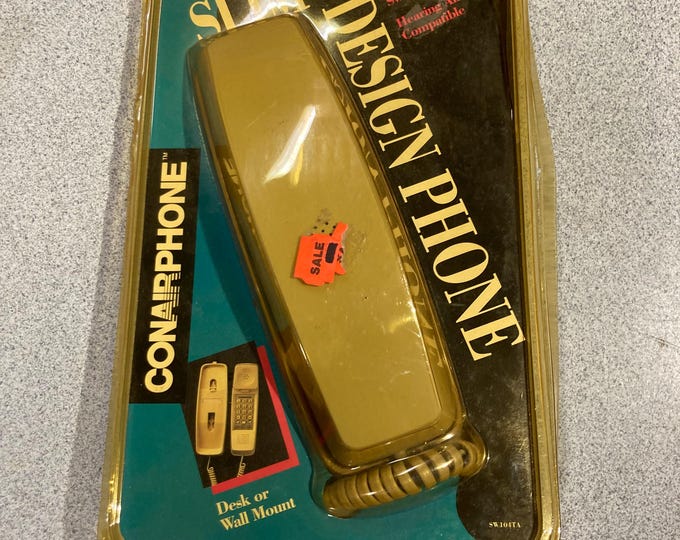 Conair Corporation Slim Design Telephone In Packaging.  Model SW 104TA.