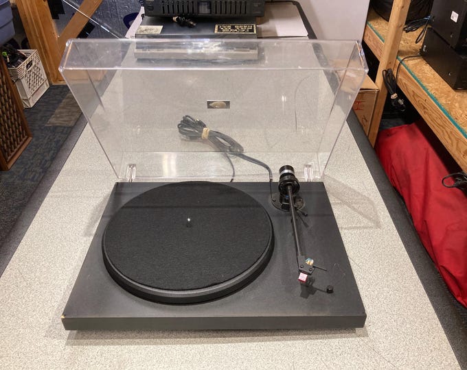 Music Hall MMF-2 Turntable. Powers On and Functions Work. (One Foot on Bottom Is Missing)  Selling As Is.
