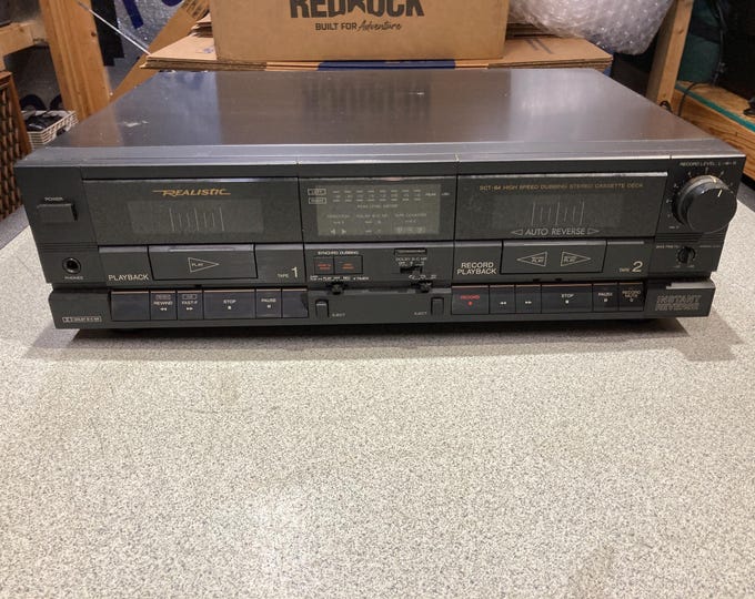 Realistic Dual Cassette Deck. Model SCT-84.  Powers On But Will Not Play Tapes. May Need Belts. Selling As Is...Parts or Repair.