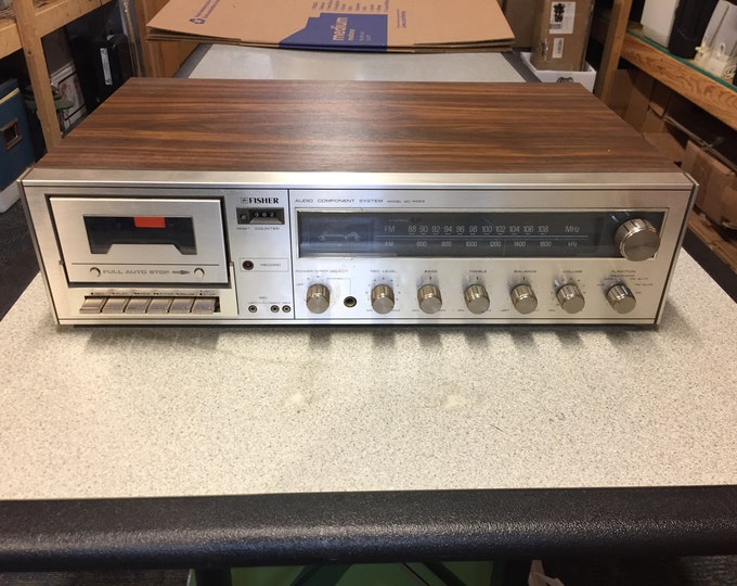 Fisher Audio Component System  Model No. MC-4023. Tested & Works...Tape Player Drags So Will Need New Belts.  Selling As Is.