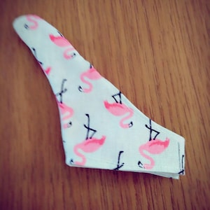 thumb cover, anti-sucking glove, help them stop sucking their thumb, left and right handed, adjustable closure, pink flamingo pattern