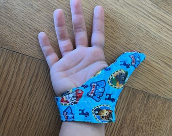 cache pouce protège pouce gant anti succion aide pour arrêter de sucer leur pouce gaucher et droitier fermeture réglable ambidextre