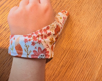 Copri pollice, protezione per il pollice, guanto anti-suzione, aiuta a smettere di succhiarsi il pollice, per mancini e destrimani, chiusura regolabile, ambidestro