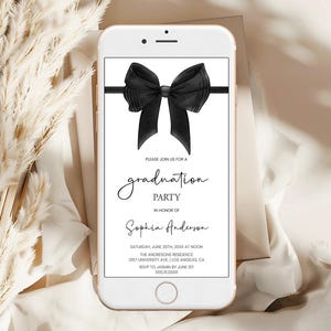 May include: Black and white graduation party invitation with a large black bow on a white background. The text reads "Please join us for a graduation party in honour of Sophia Anderson. Saturday, June 20th, 20XX at noon. The Andersons Residence 1357 University Ave Los Angeles CA. RSVP to Jasmin by June 1st 556.10000"