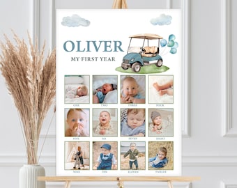 May include: A white poster with a blue golf cart and balloons. The poster is titled "Oliver My First Year" and has 12 photos of a baby boy, one for each month of the year.