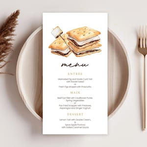 May include: A vertical menu card featuring a watercolor illustration of s'mores at the top. The text lists courses including Entrée, Main, and Dessert with specific food items like Marinated Fig and Goats Curd Tart, Beef Eye Fillet, and Lemon Tart.