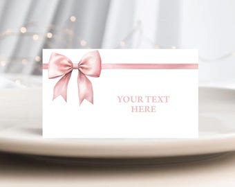 May include: A white card with a pink bow and ribbon. The text "YOUR TEXT HERE" is printed on the card.