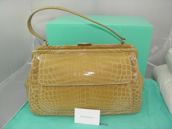 beige satchel handbag