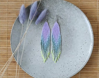Lavender beaded earrings with sage green ombre fringe