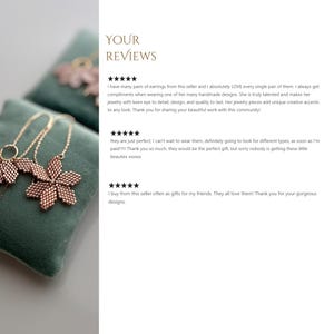 May include: Two delicate gold necklaces with flower-shaped pendants. The flower pendants are made of small, golden beads and have a delicate, feminine design. The necklaces are displayed on a green velvet cushion. The image includes customer reviews praising the quality and design of the jewelry.