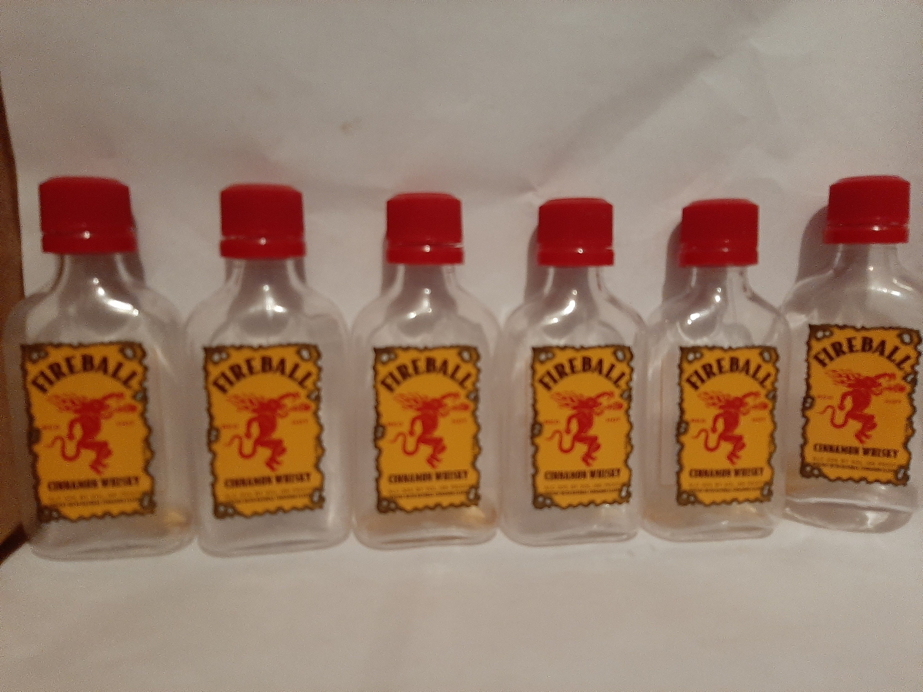 6 Fireball Mini Liquor Bottles, Empty, With Caps. 50ml Plastic USED