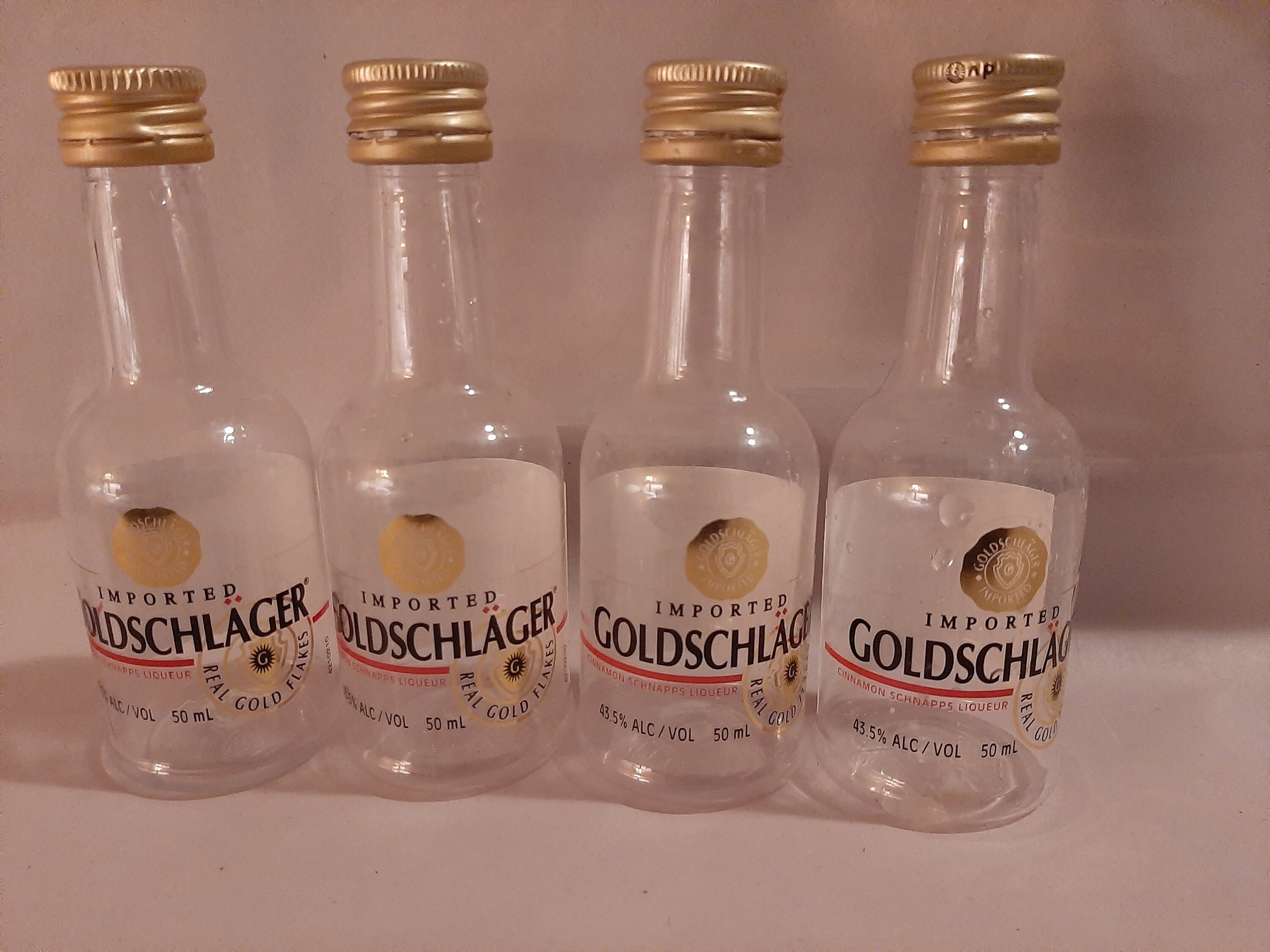 4 empty mini liquor bottles Goldschlager plastic with caps Etsy