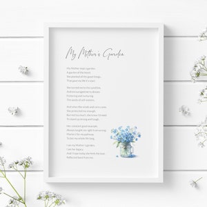 May include: A white framed print featuring a poem titled "My Mother's Garden". The poem is about a mother's love and guidance. The print includes a watercolour illustration of a mason jar filled with forget-me-not flowers.