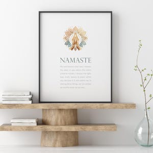 May include: A printable wall art print featuring a gold and blue mandala design with the word "Namaste" in a light grey font. The text below the mandala reads "My soul honours your soul. I honour the place in you where the entire universe resides. I honour the light, love, truth, beauty & peace within you because it is also within me. In sharing these things, we are united, we are the same, we are one."