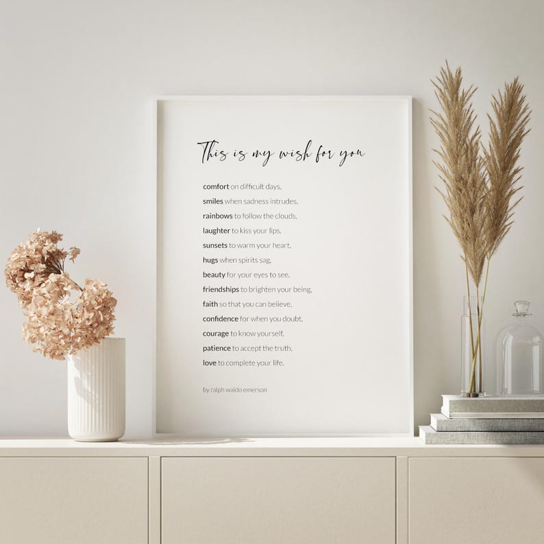 May include: A white framed print with a black and white text quote that reads "This is my wish for you" and lists a series of wishes, ending with "by ralph waldo emerson".