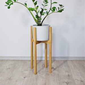 Tall plant stands made of natural oak wood. image 4