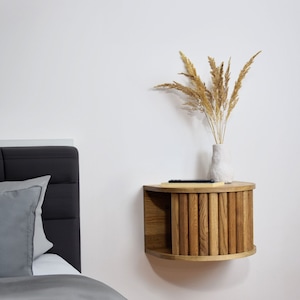 Floating wooden nightstand. Tambour bedside table.