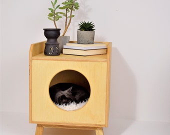 Indoor cat house, made of plywood, minimalist design.