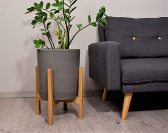 Concrete Pot with wooden Plant Stand, Minimalist Design.