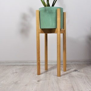 Tall plant stands made of natural oak wood. image 2