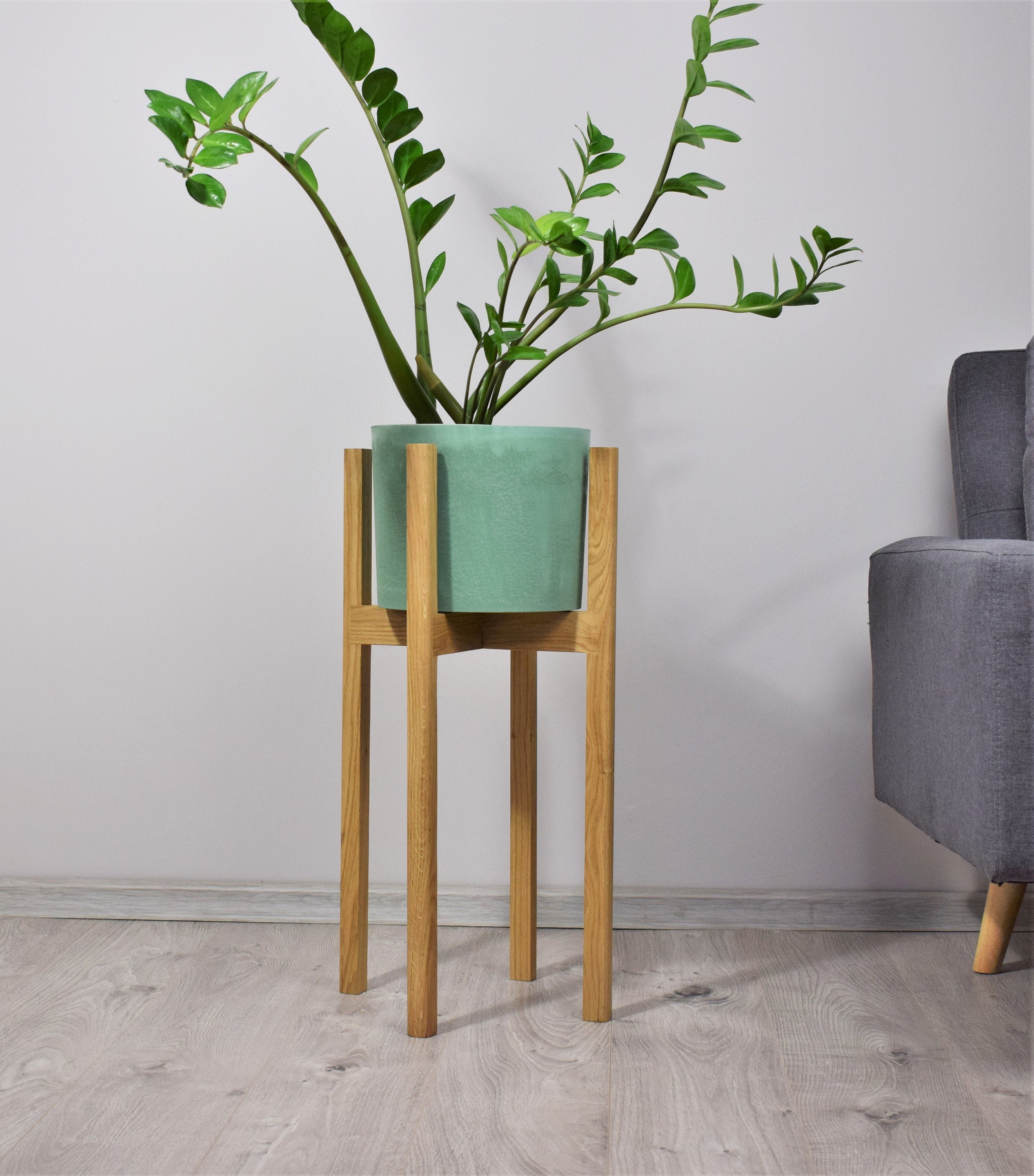 tall plant stands made of natural oak wood. - etsy