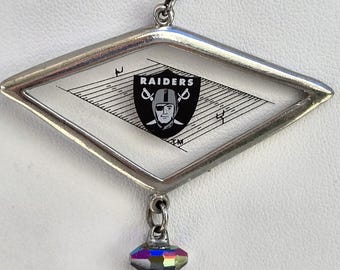 Vintage Raiders Logo Earrings: Faceted Football Dangle, 1980s-90s