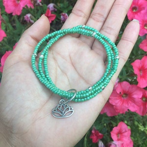 Aqua teal beaded bracelet~ lotus charm bracelet~ spuritual healing jewelry~ intention beacelet~ new beginnings bracelet~ positivity