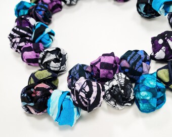 Collar de tela batik africana hecho a mano beneficia a la caridad de libros