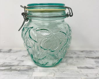 Frasco hermético de vidrio verde italiano, con tapa y motivo de frutas vintage. Ideal para encimeras de cocina.