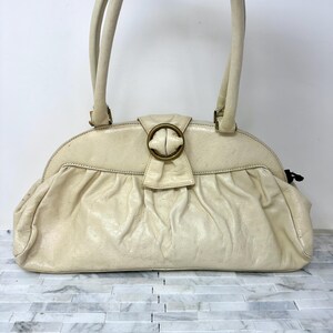 Bolso de mano vintage HOBO International Juliet, de piel enrollada en color crema con asa superior y forro de cachemira, estilo vintage, con pliegues y holgado