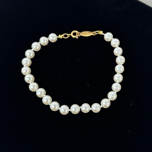 Napier Faux Pearl Bracelet 7 1/2”, Vintage Single Strand Knotted White Faux Pearl Gold Plated Spring Ring Clasp Signed Costume Jewelry