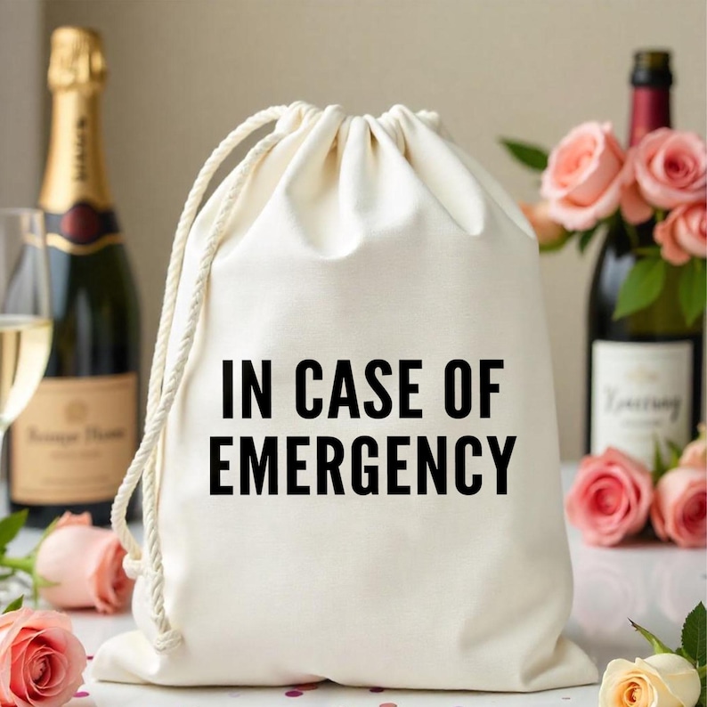 May include: A white drawstring bag with the text "IN CASE OF EMERGENCY" printed in black.