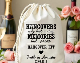 May include: White cotton drawstring bag with the text "Hangovers only last a day MEMORIES last forever HANGOVER KIT" and a heart. Below the text is "Smith & Amanda 02.09.2018".