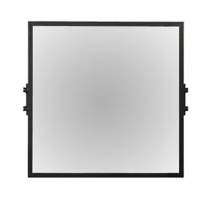 May include: A black framed whiteboard with a white surface.