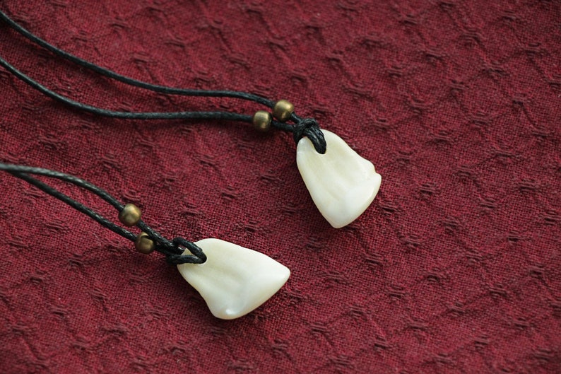 Pendant of Red Deer fang .