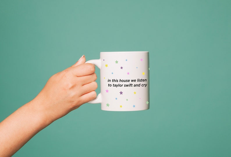 in this house we listen to taylor swift and cry | taylor swift mug | swiftie birthday gift | funny swiftie merch | dripped in rose etsy 